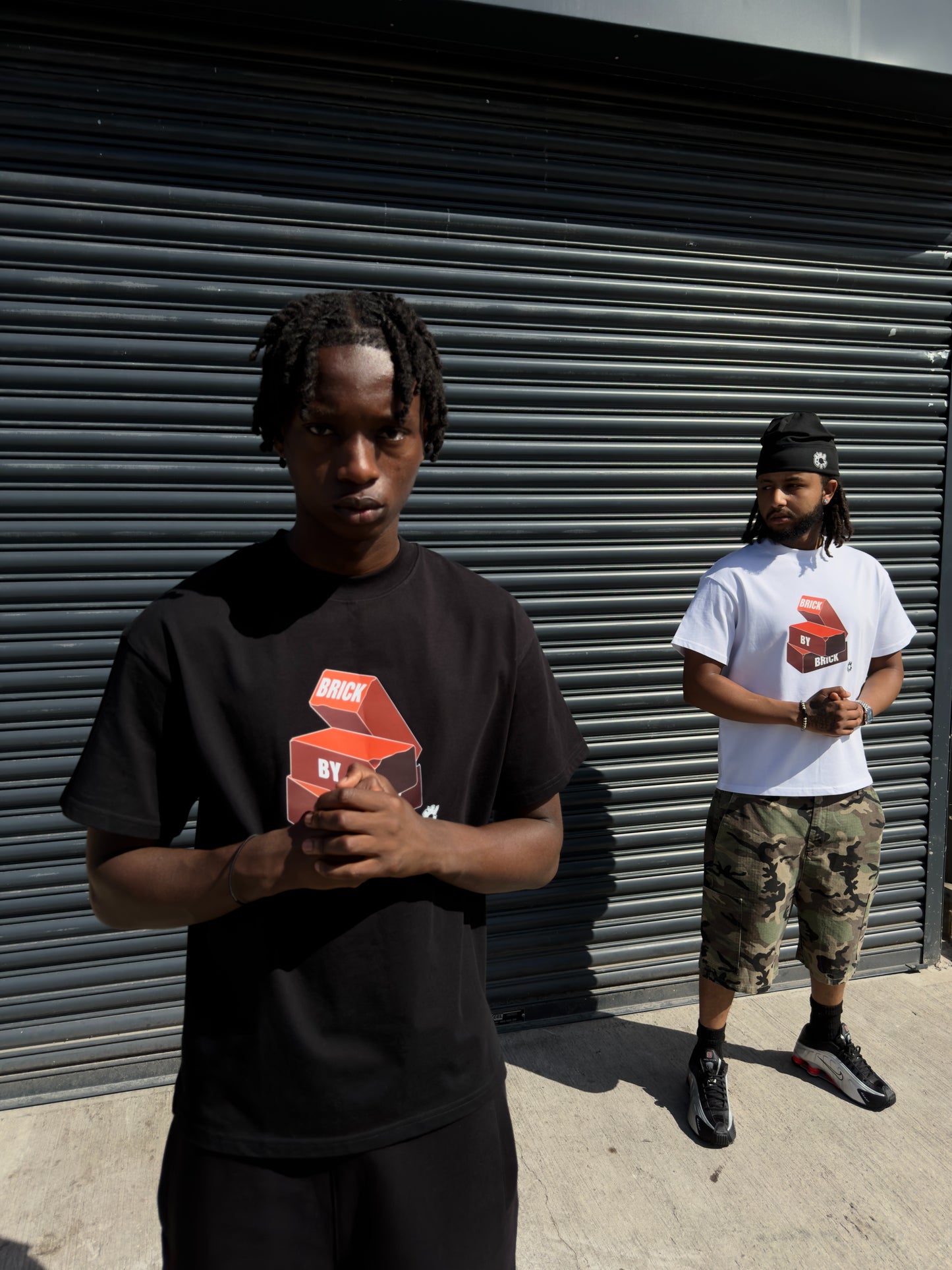 BRICK BY BRICK TEE