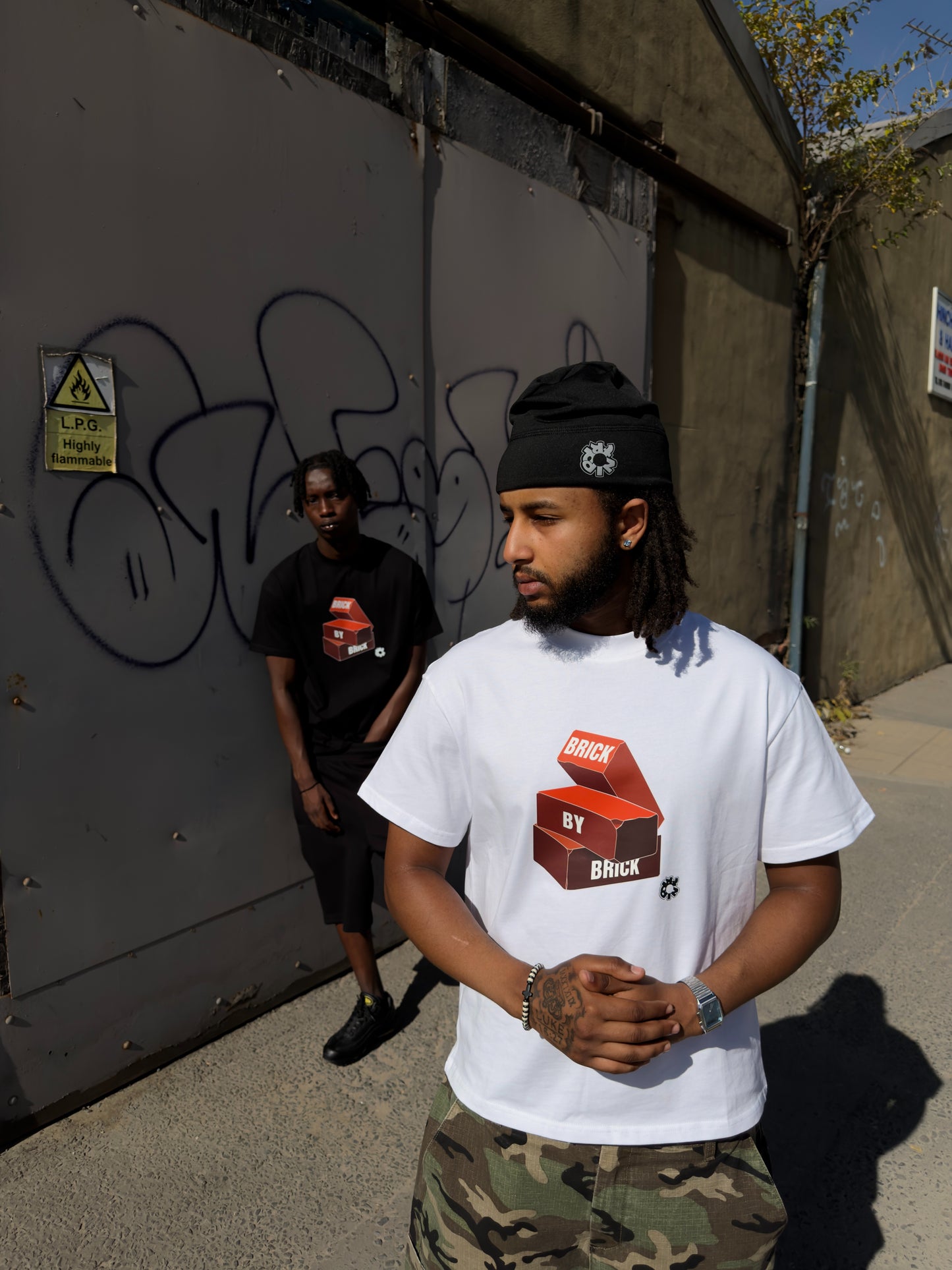 BRICK BY BRICK TEE